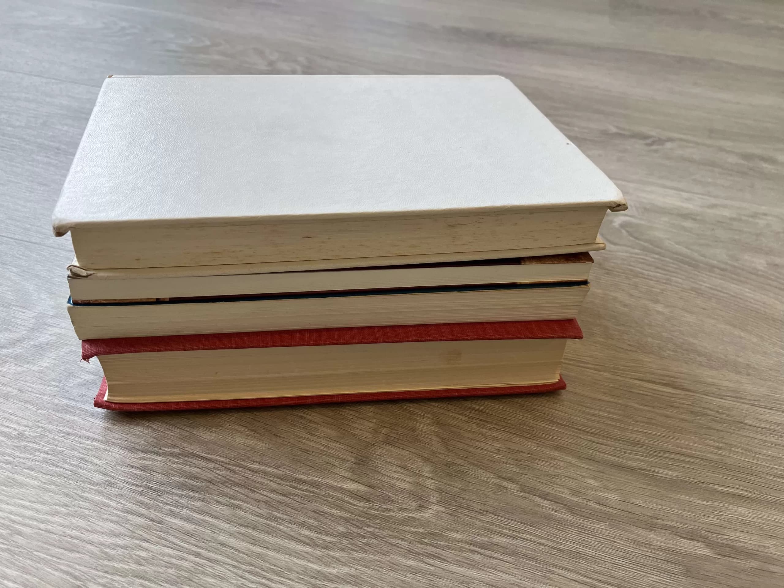 Used books stacked and ready to donate